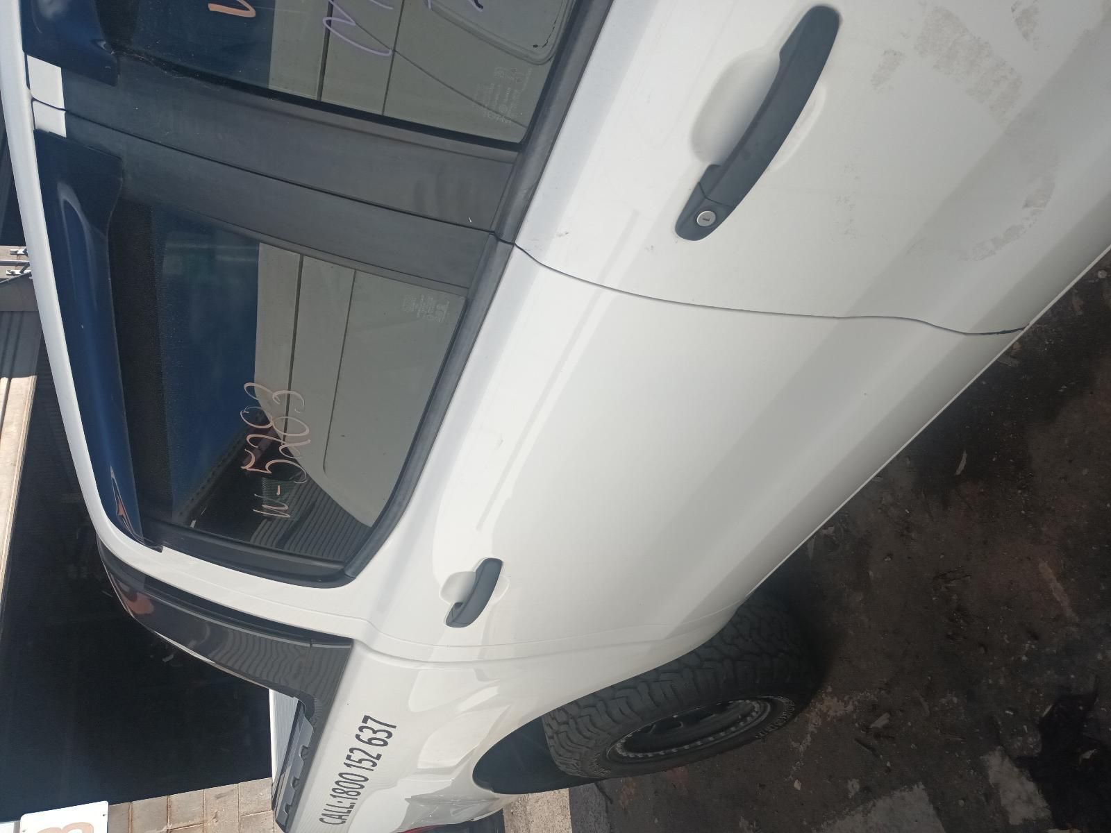 A White Car with a Numbers Written on Window — South West 4WD Wreckers in Harristown, QLD