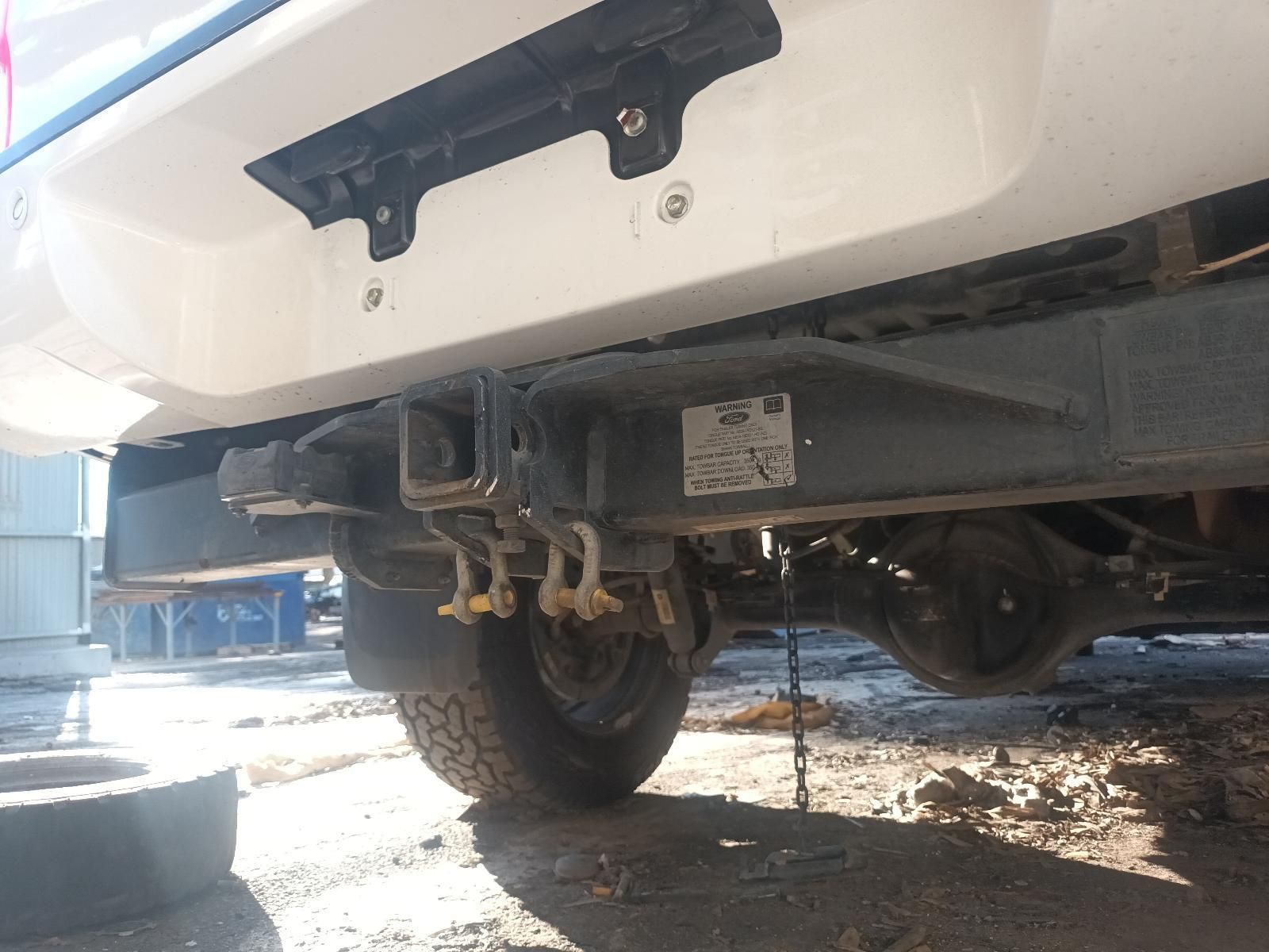 A White Truck with a Tow Hook Attached to It — South West 4WD Wreckers in Harristown, QLD