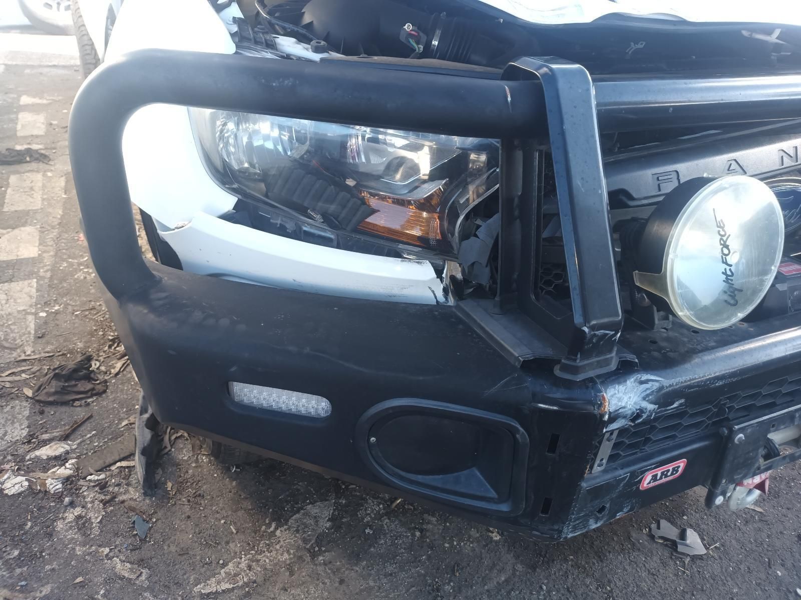 A Black Truck with a Bumper That Has Been Damaged — South West 4WD Wreckers in Harristown, QLD