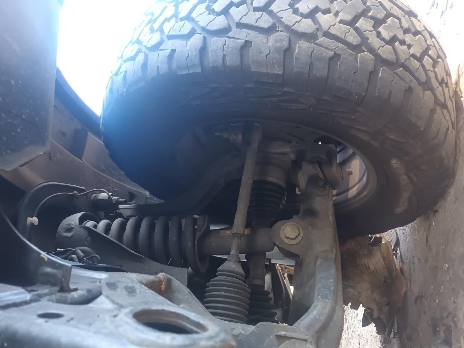 A Close Up of a Tire on a Car's Suspension — South West 4WD Wreckers in Harristown, QLD