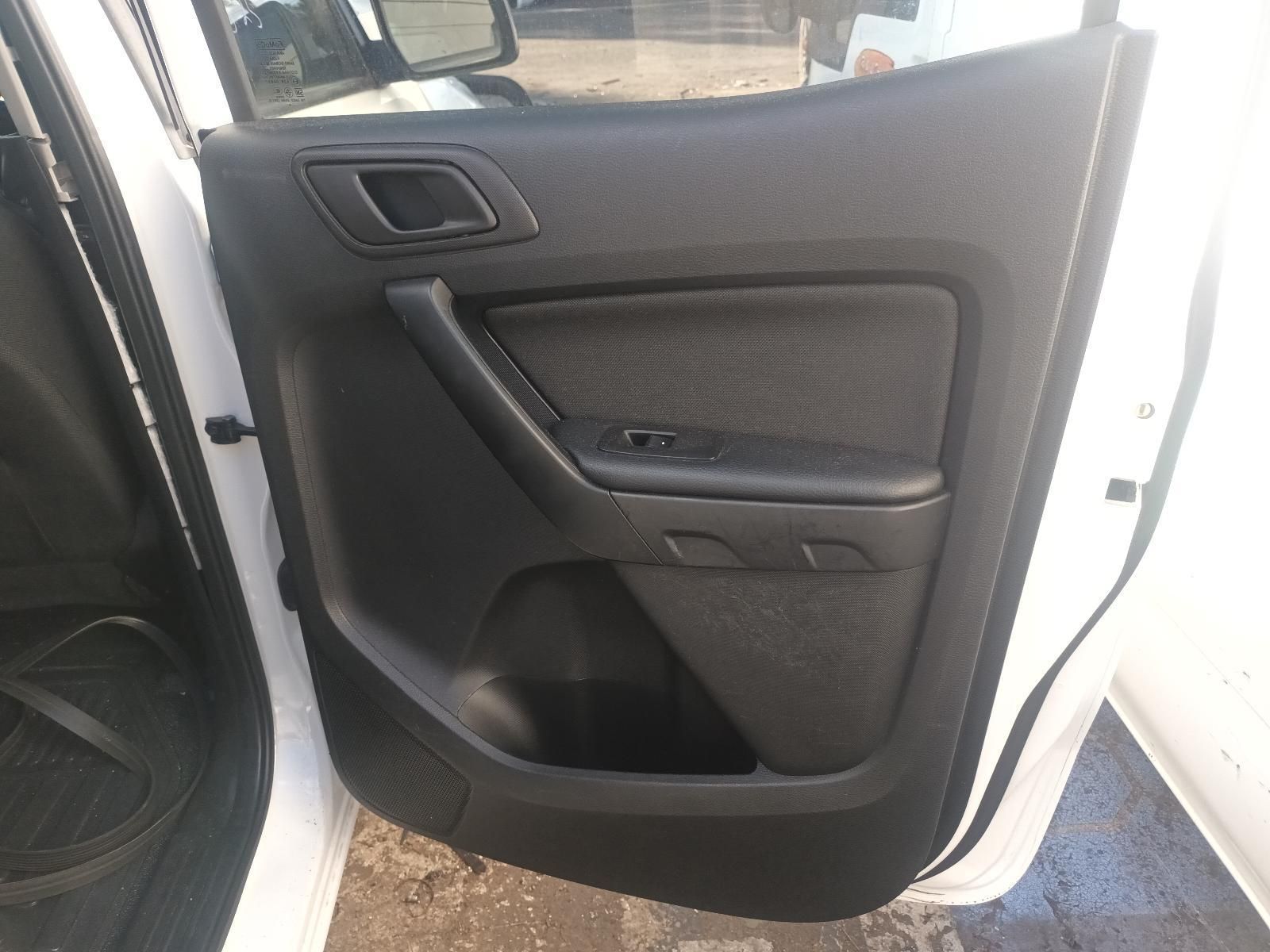 The Inside of a White Car with the Door Open — South West 4WD Wreckers in Harristown, QLD