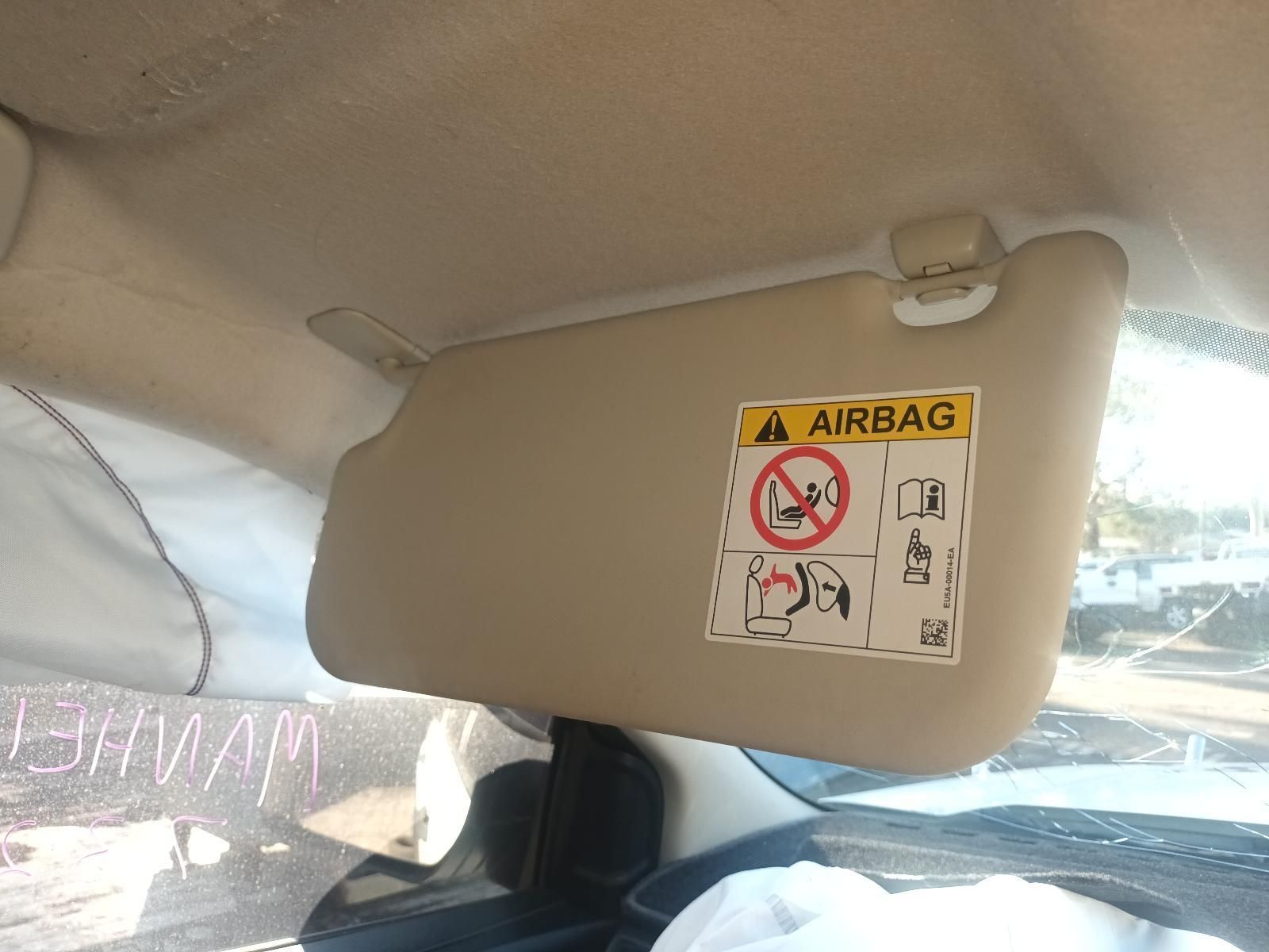 A Sun Visor with an Airbag Sticker on It — South West 4WD Wreckers in Harristown, QLD