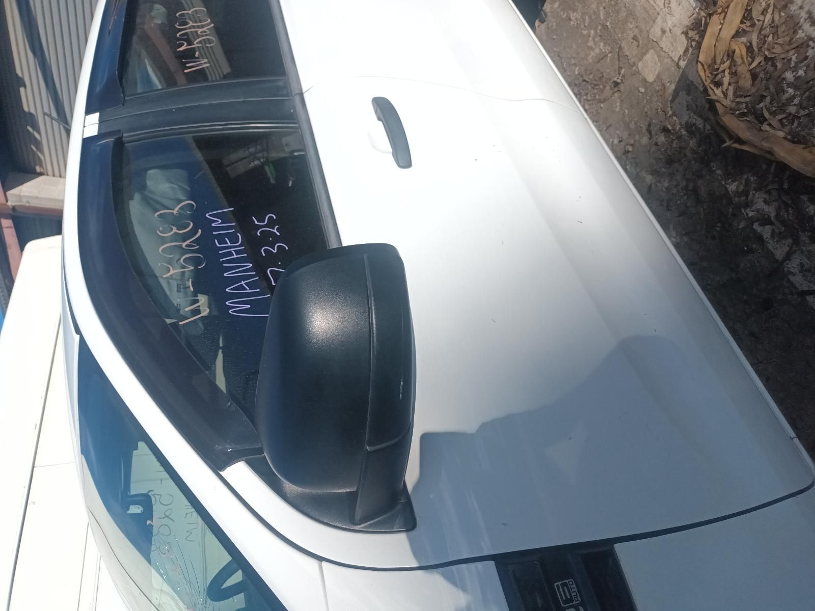A White Car with the Word Maneki Written on the Door — South West 4WD Wreckers in Harristown, QLD