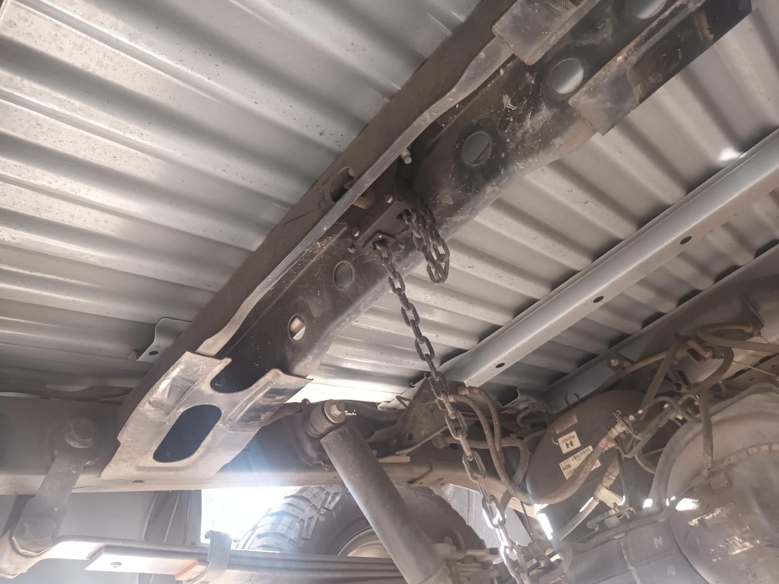 The Bottom of a Truck with a Chain Attached to It — South West 4WD Wreckers in Harristown, QLD