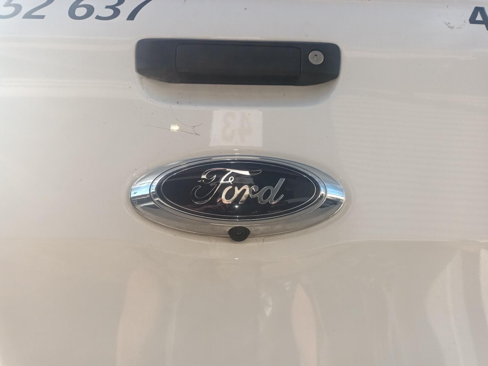 A Close Up of a Ford Emblem on a White Vehicle — South West 4WD Wreckers in Harristown, QLD