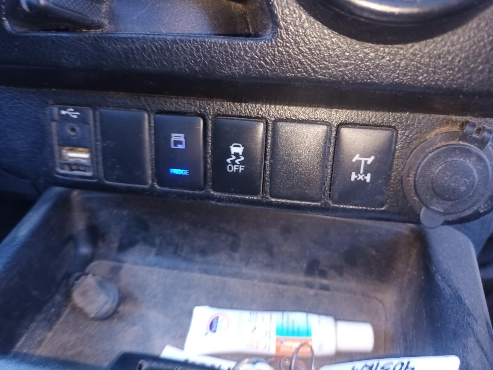 An Ointment Tube Sits in a Car Dashboard — South West 4WD Wreckers in Harristown, QLD
