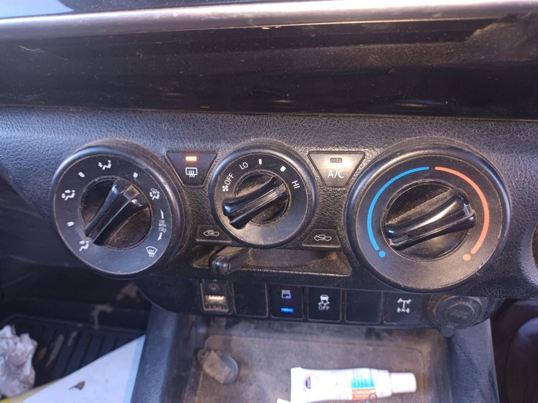 A Close Up of a Car Dashboard with a Tube of Ointment — South West 4WD Wreckers in Harristown, QLD