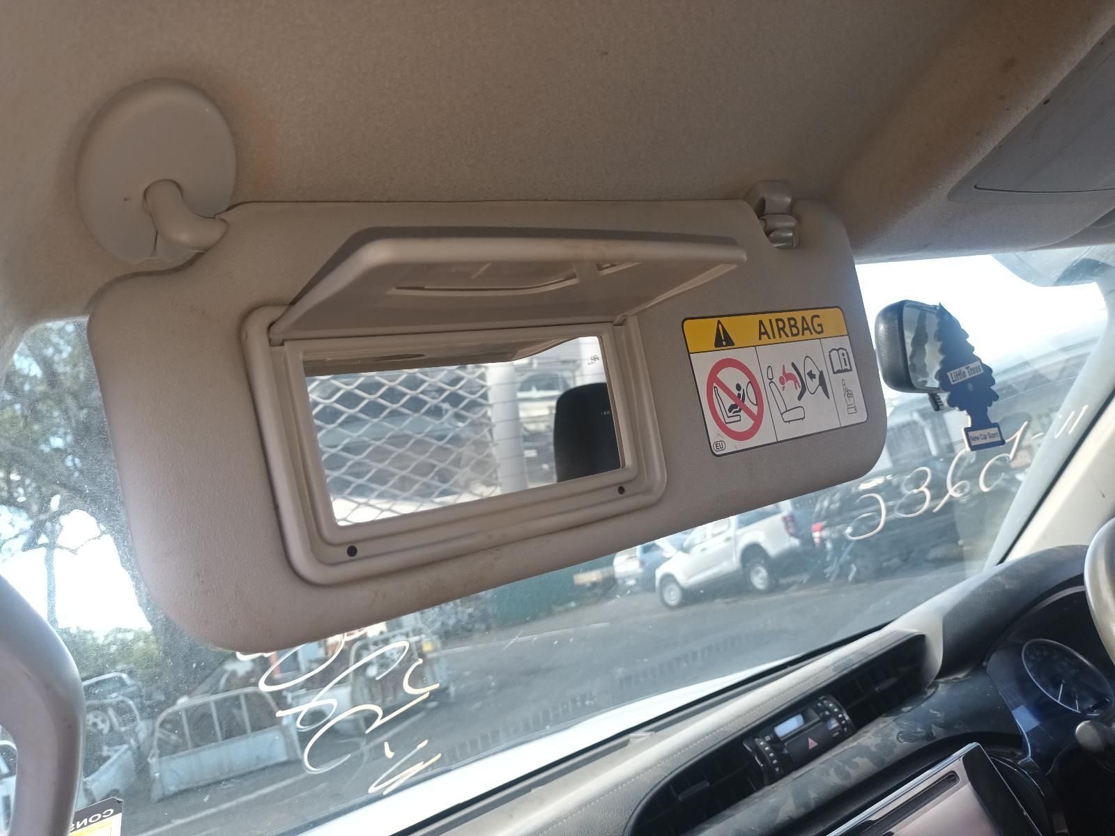 A Car with a Sun Visor and a Mirror on the Windshield — South West 4WD Wreckers in Harristown, QLD