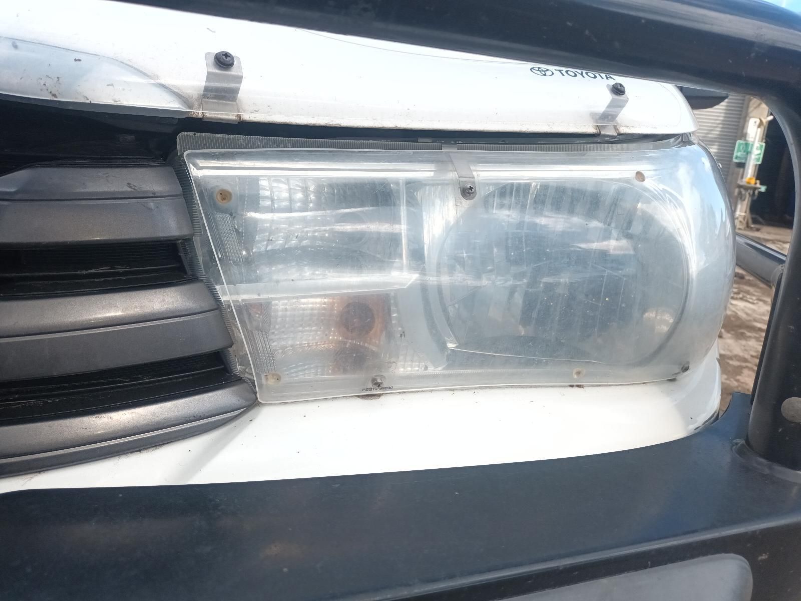 A Close Up of a Headlight on a Car — South West 4WD Wreckers in Harristown, QLD