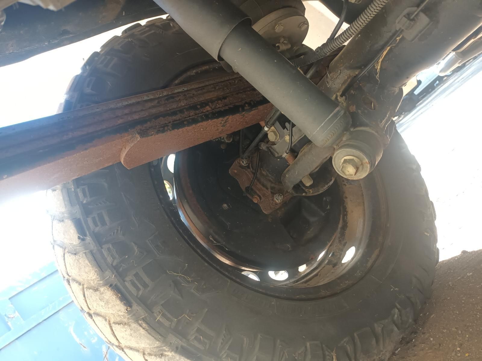 A Close Up of a Tire and Shock Absorber on a Truck — South West 4WD Wreckers in Harristown, QLD