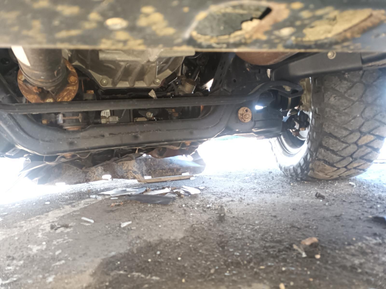 A Close Up of the Underside of a Car on the Ground — South West 4WD Wreckers in Harristown, QLD