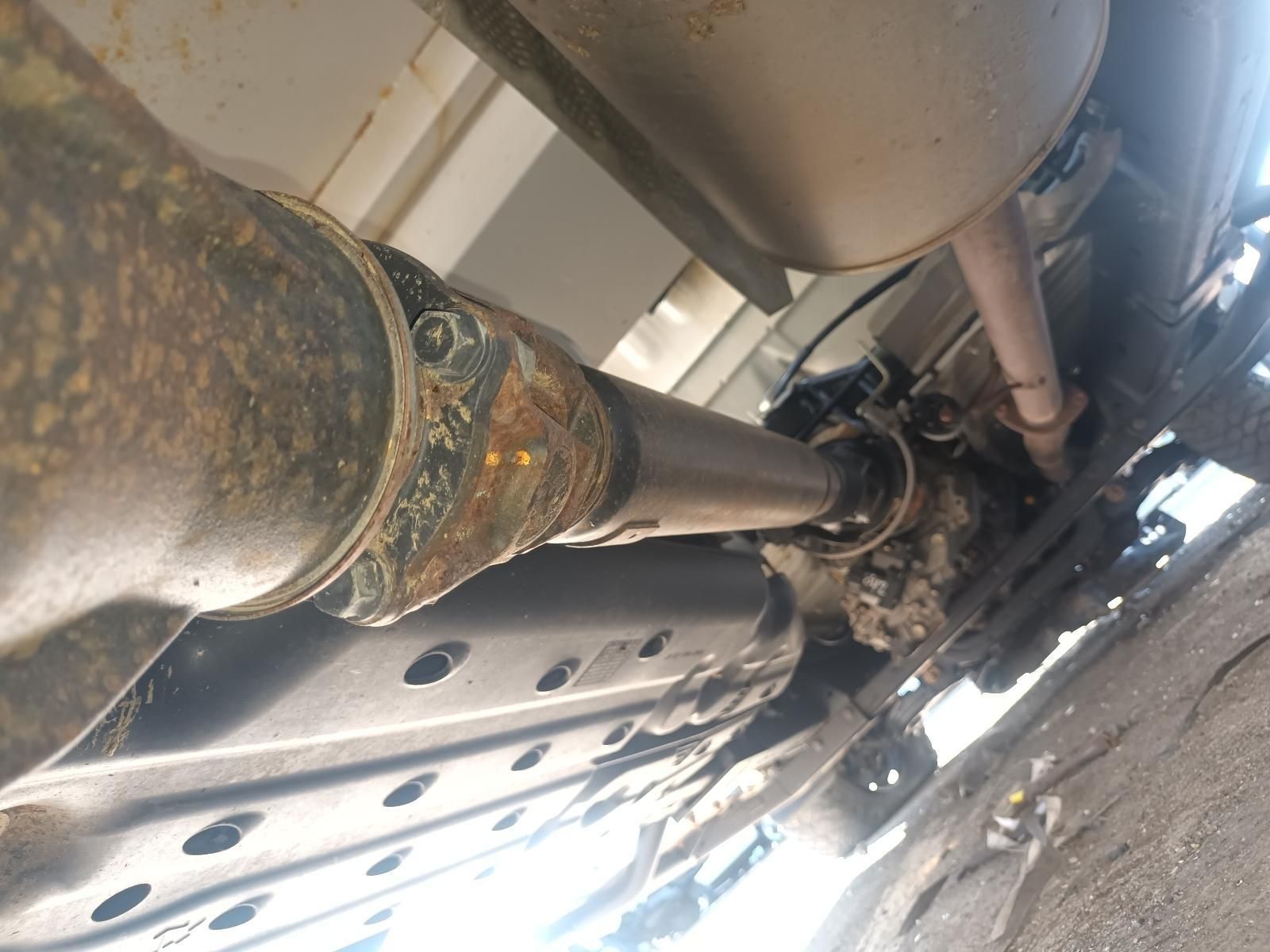 A Close Up of the Underside of a Car with an Exhaust Pipe — South West 4WD Wreckers in Harristown, QLD