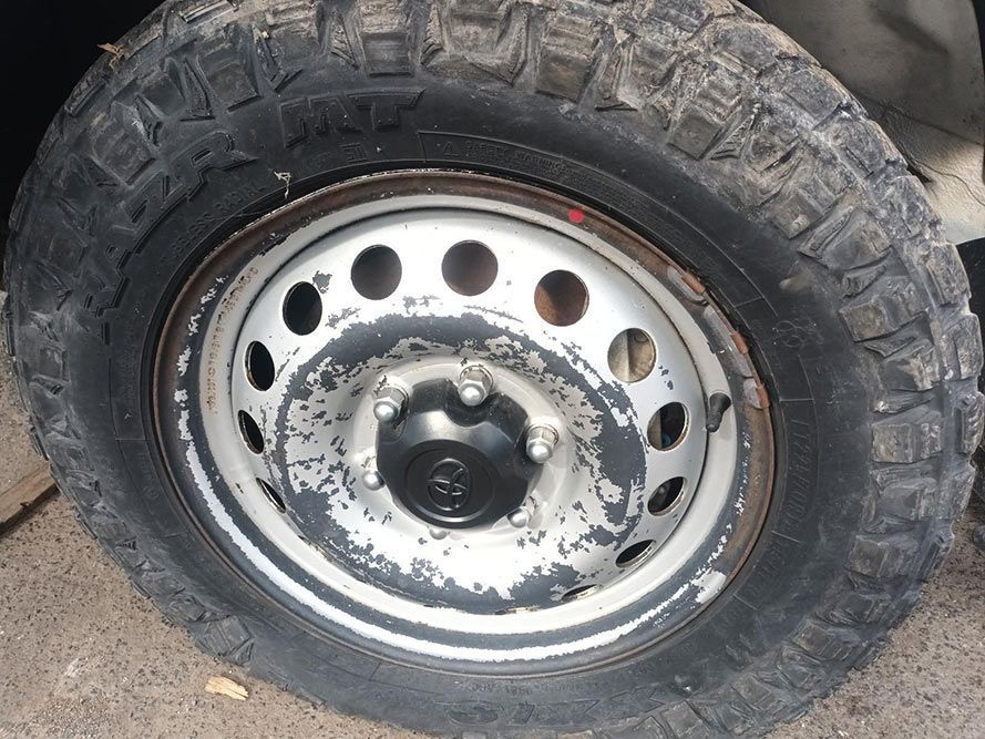 A Close Up of a Tire with Holes in It — South West 4WD Wreckers in Harristown, QLD