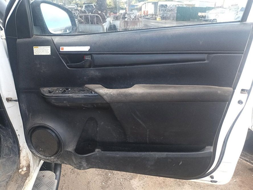 The Door Panel of a White Car is Dirty and Needs to Be Cleaned — South West 4WD Wreckers in Harristown, QLD