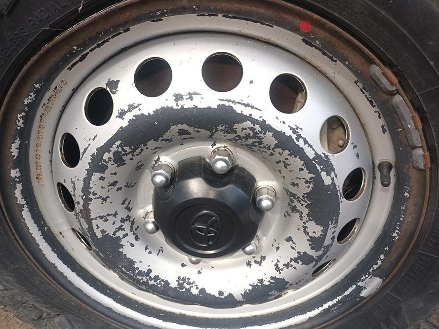 A Close Up of a Car Wheel with Holes in It — South West 4WD Wreckers in Harristown, QLD