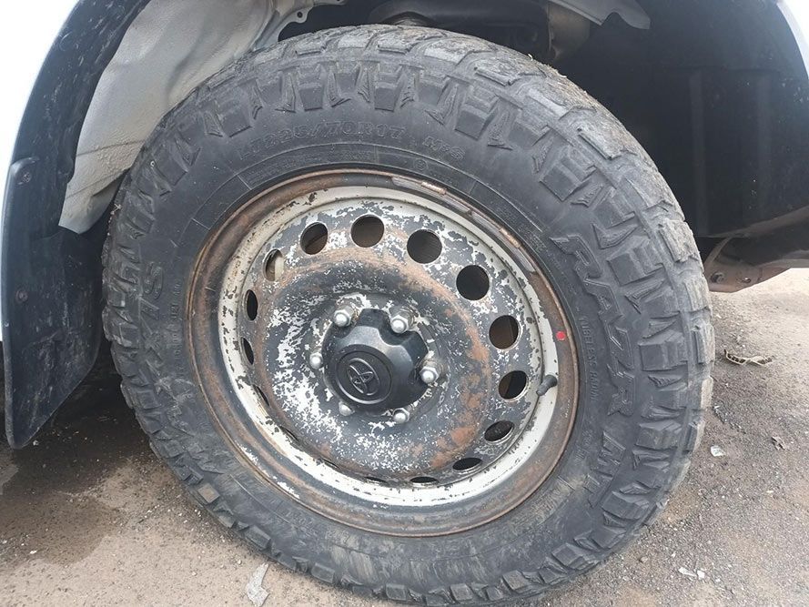 A Close Up of a Tire on a White Truck — South West 4WD Wreckers in Harristown, QLD