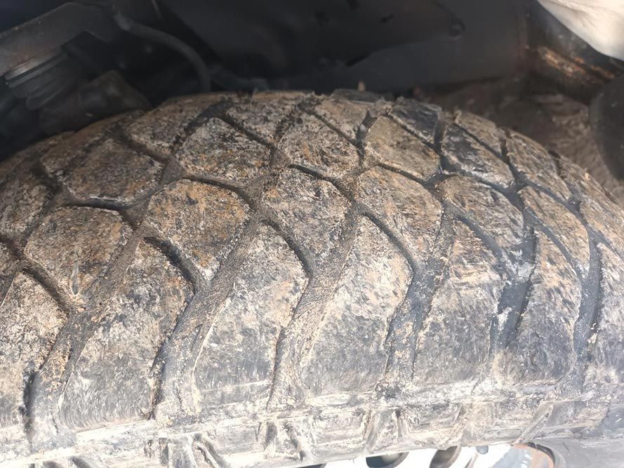 A Close Up of a Dirty Tire on a Car — South West 4WD Wreckers in Harristown, QLD