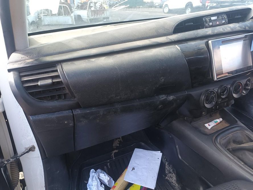 The Dashboard of a Car with a Broken Airbag and a Radio — South West 4WD Wreckers in Harristown, QLD