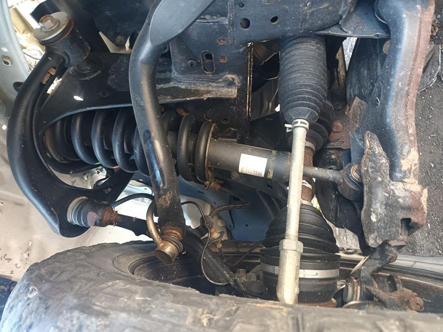 A Close Up of the Underside of a Car Showing the Suspension and Steering System — South West 4WD Wreckers in Harristown, QLD