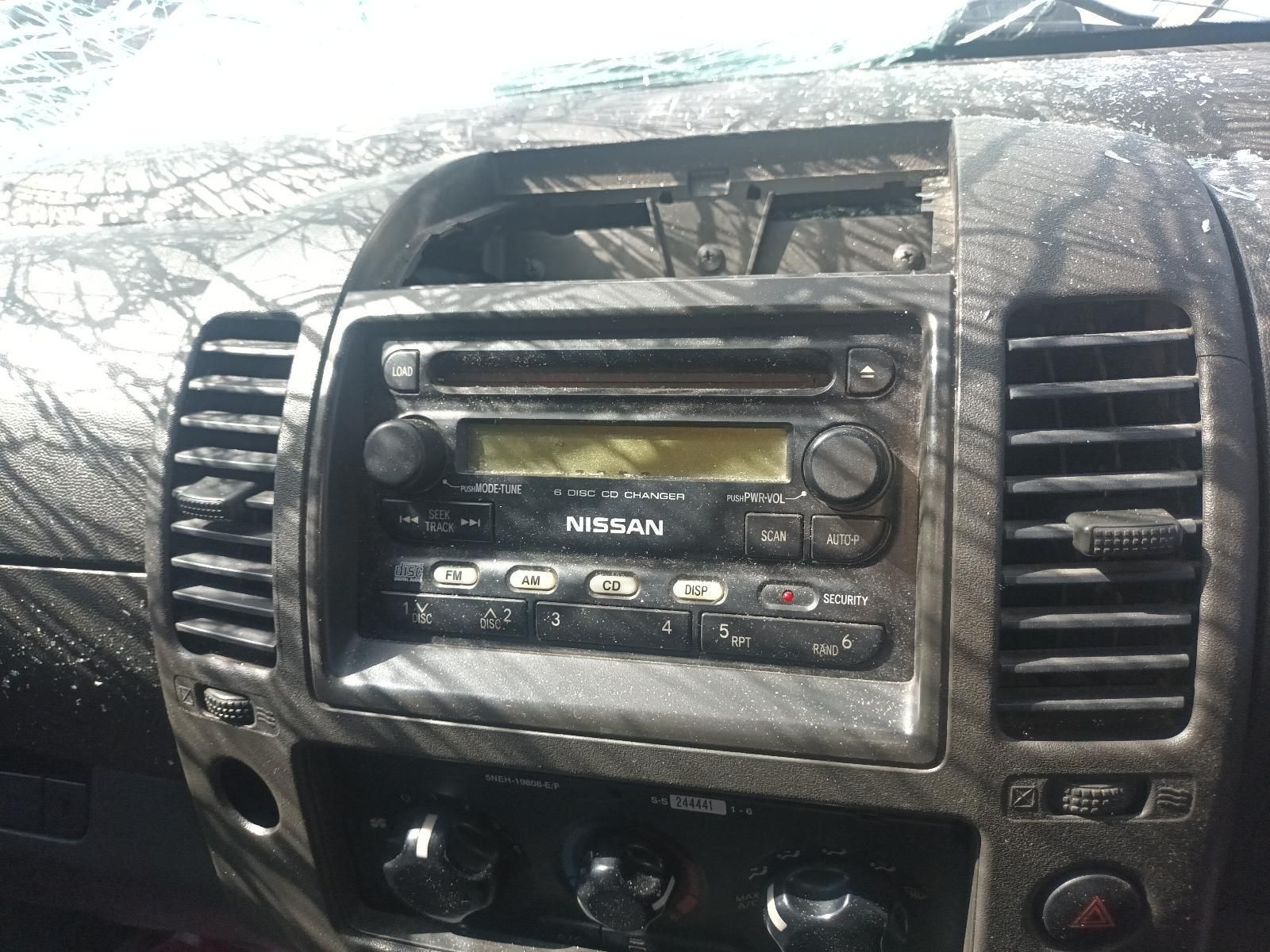 A Nissan Radio is Sitting on the Dashboard of a Car — South West 4WD Wreckers in Harristown, QLD
