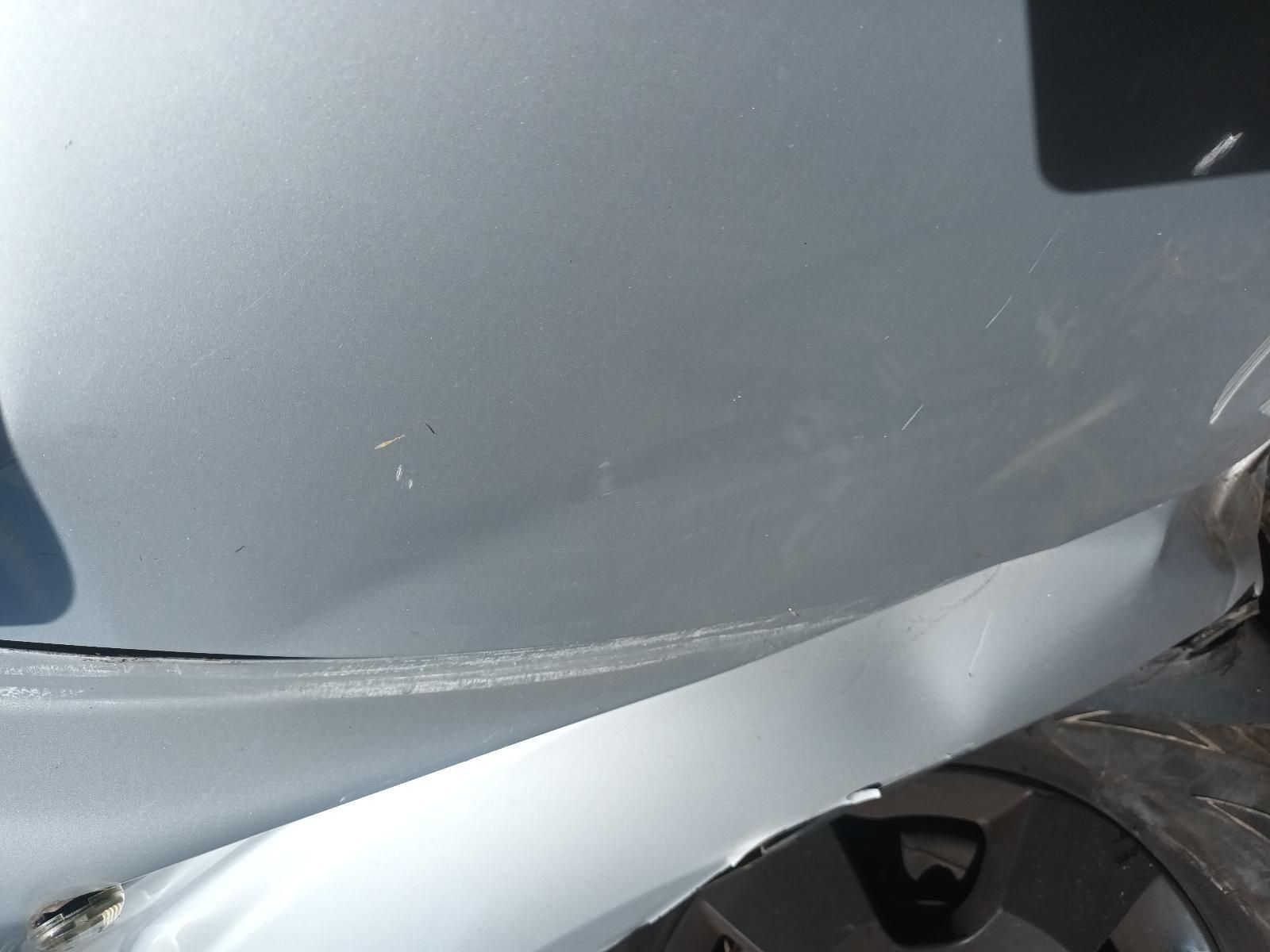 A Close Up of a Silver Car with a Damaged Fender — South West 4WD Wreckers in Harristown, QLD