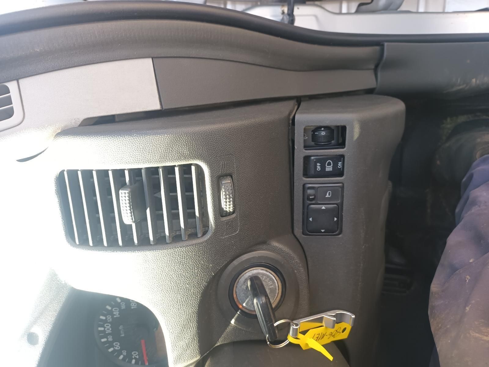 A Close Up of a Car Dashboard with a Key in the Ignition — South West 4WD Wreckers in Harristown, QLD