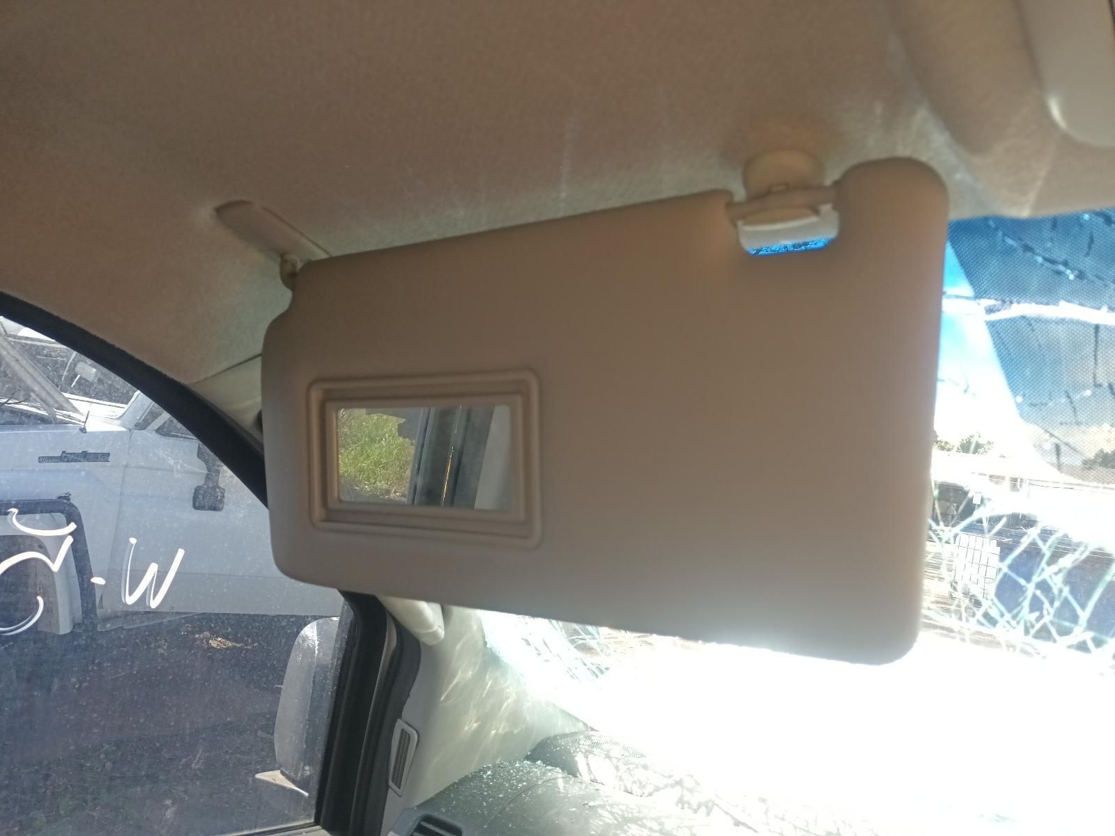 A Sun Visor is Hanging from the Ceiling of a Car — South West 4WD Wreckers in Harristown, QLD