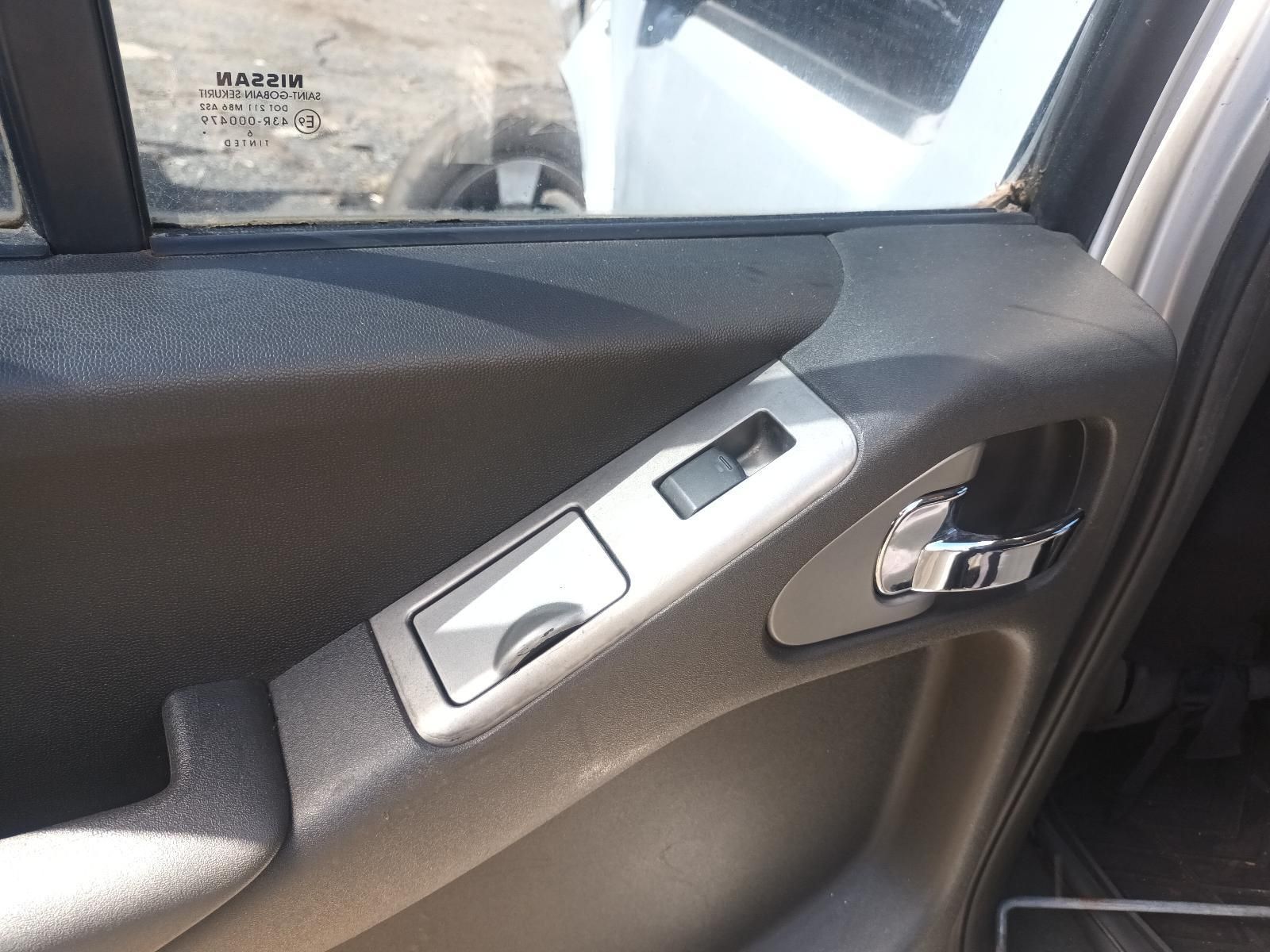 A Close Up of a Car Door with a Window Switch — South West 4WD Wreckers in Harristown, QLD