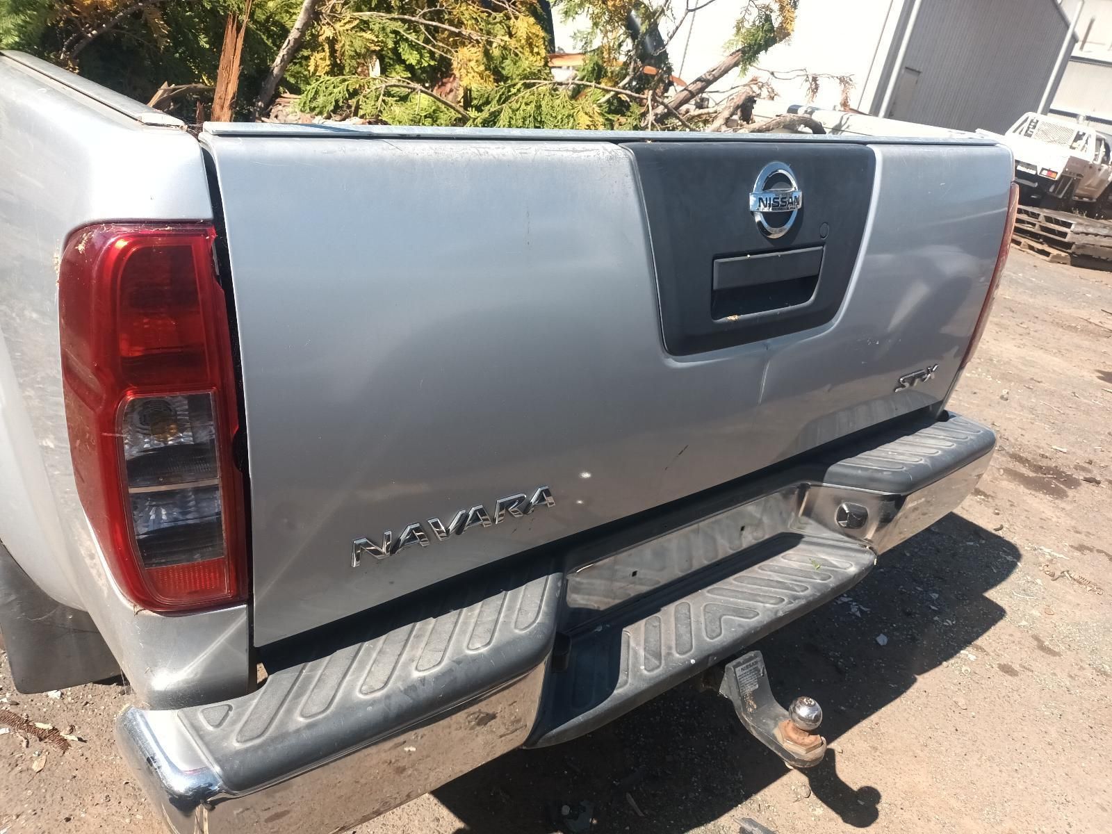 A Silver Nissan Pickup Truck is Parked in a Parking Lot — South West 4WD Wreckers in Harristown, QLD