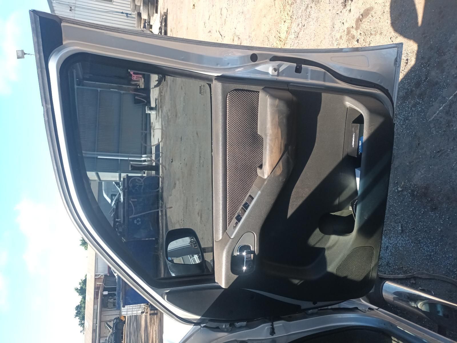 A Car with the Door Open is Parked on the Side of the Road — South West 4WD Wreckers in Harristown, QLD