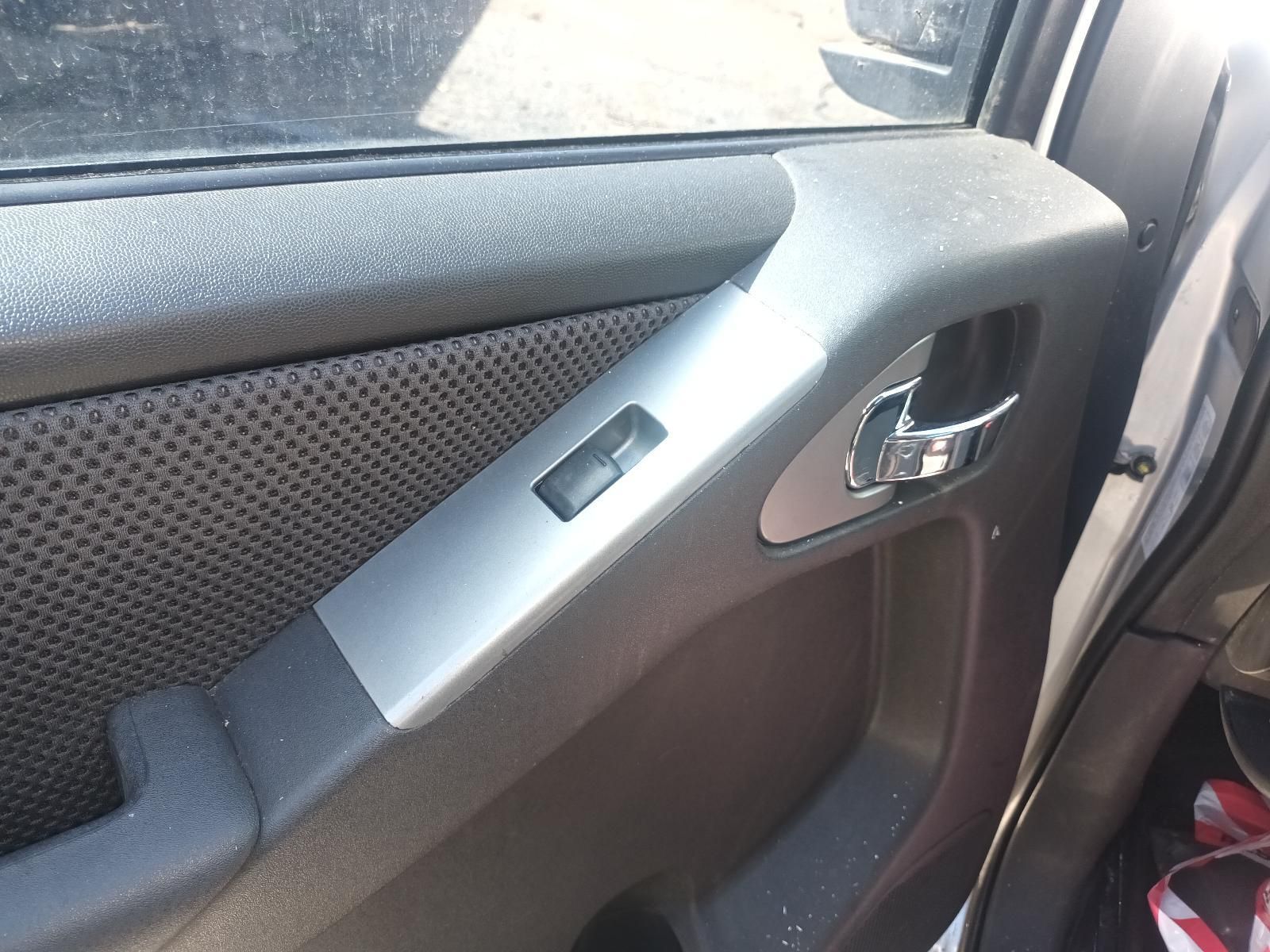 A Close Up of a Car Door with a Button on It — South West 4WD Wreckers in Harristown, QLD