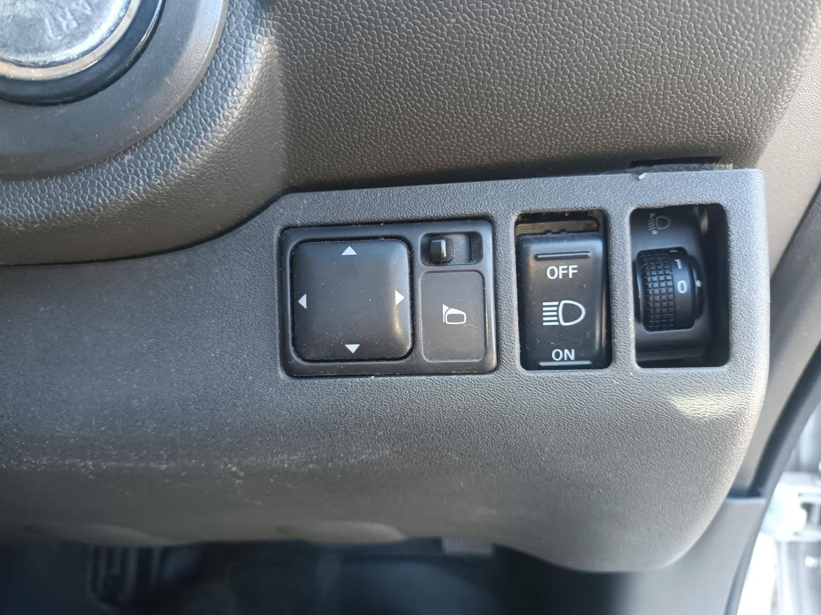 A Close Up of a Car's Dashboard with a Mirror and a Light Switch — South West 4WD Wreckers in Harristown, QLD