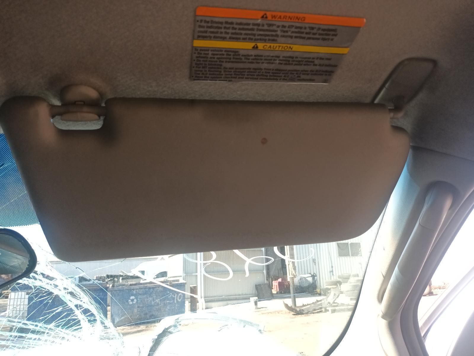 A Sun Visor with a Warning Label on It — South West 4WD Wreckers in Harristown, QLD