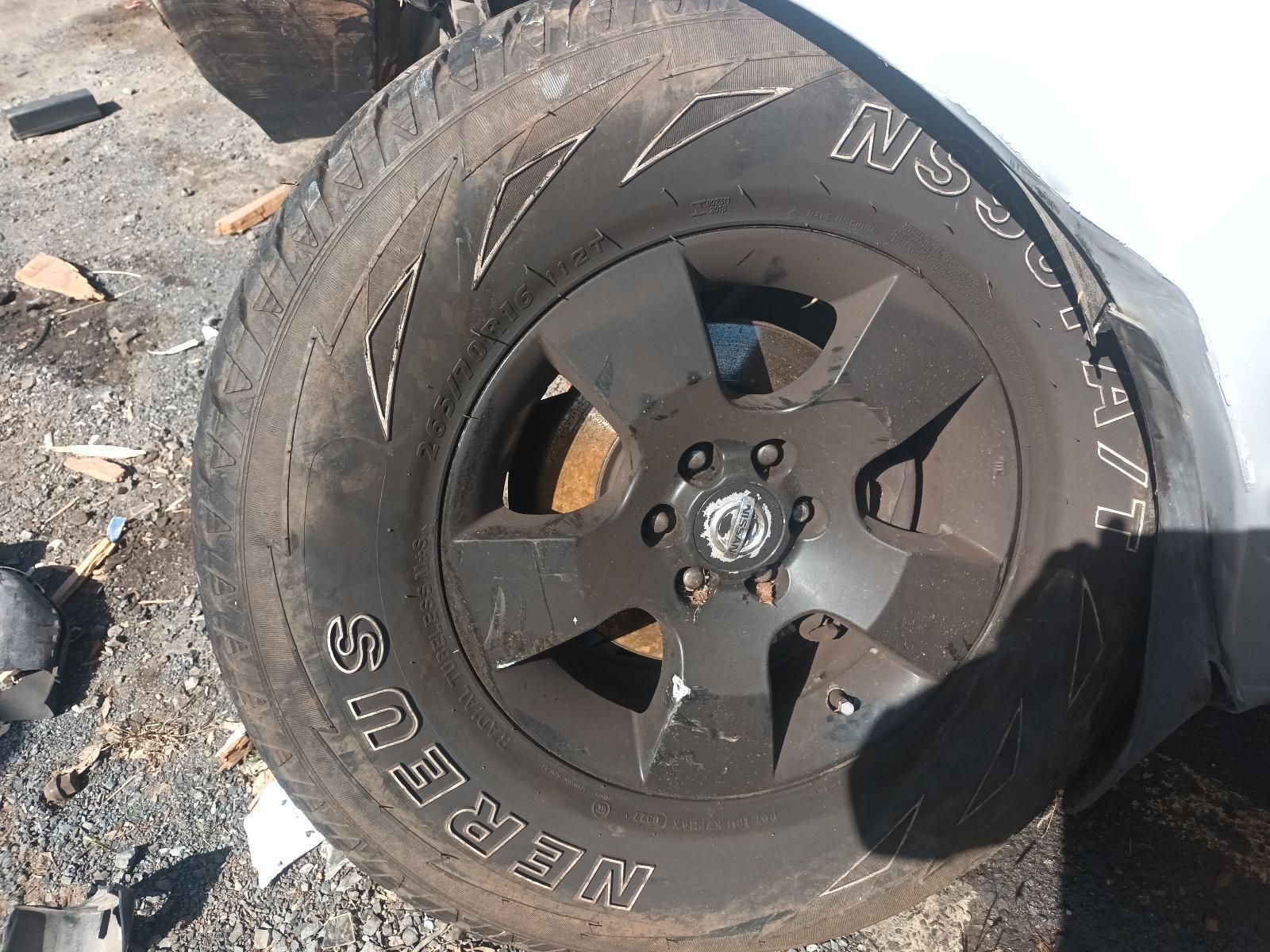 A Close Up of a Tire That Says Nissan on It — South West 4WD Wreckers in Harristown, QLD