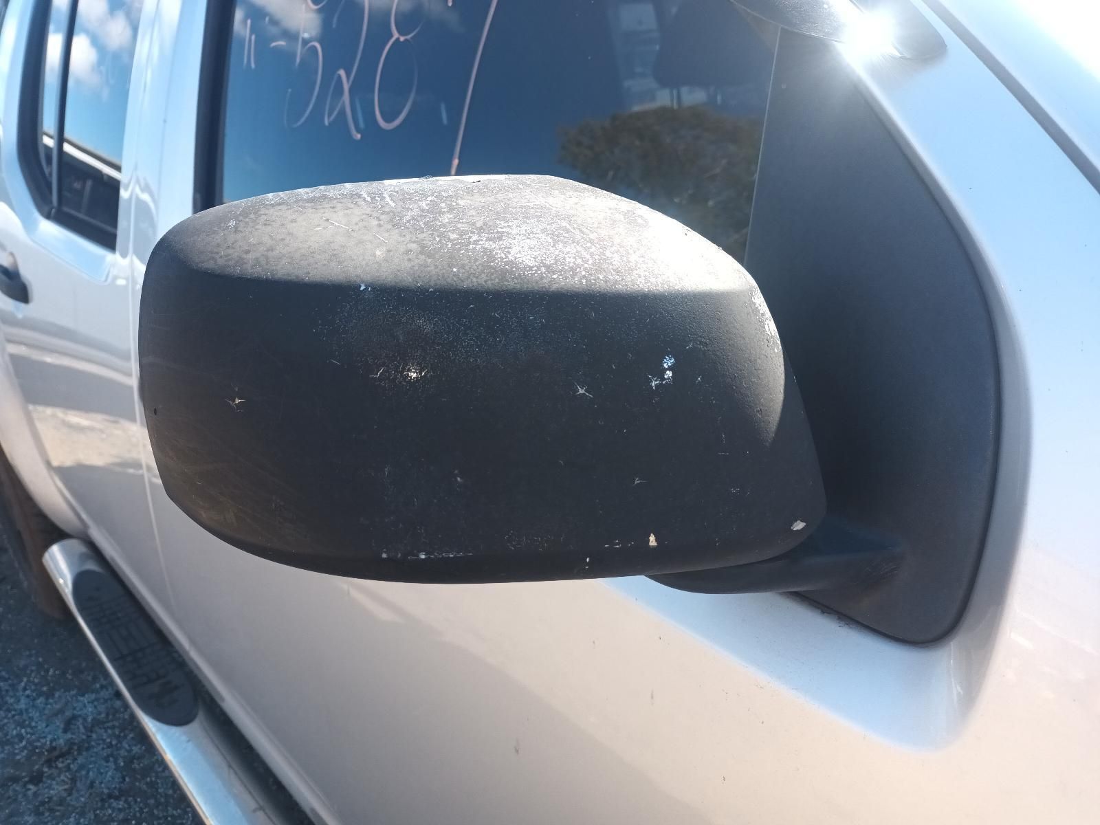 A Close Up of a Side View Mirror on a White Car — South West 4WD Wreckers in Harristown, QLD