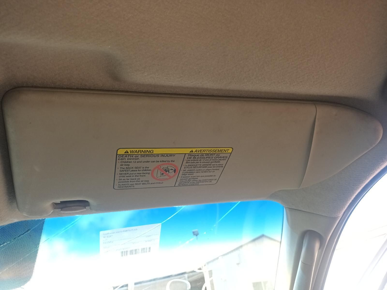 A Sun Visor is Hanging from the Ceiling of a Car — South West 4WD Wreckers in Harristown, QLD