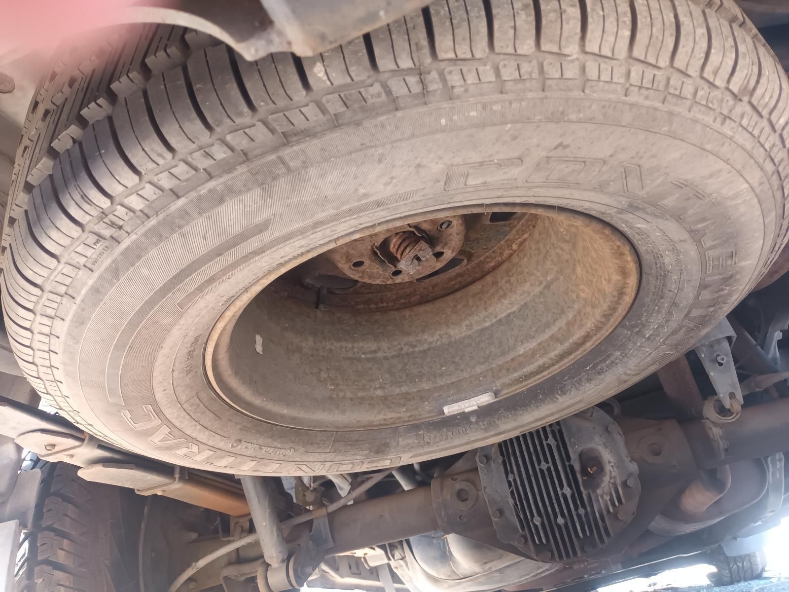 A Close Up of a Tire on the Bottom of a Car — South West 4WD Wreckers in Harristown, QLD