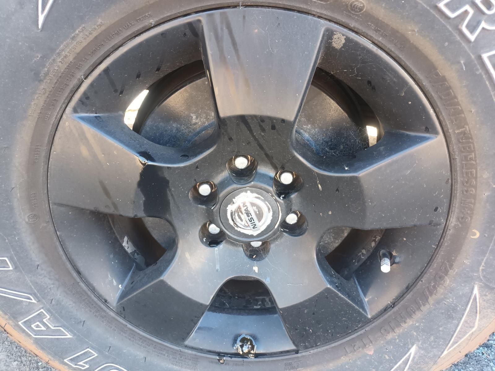 A Close Up of a Nissan Tire and Rim — South West 4WD Wreckers in Harristown, QLD