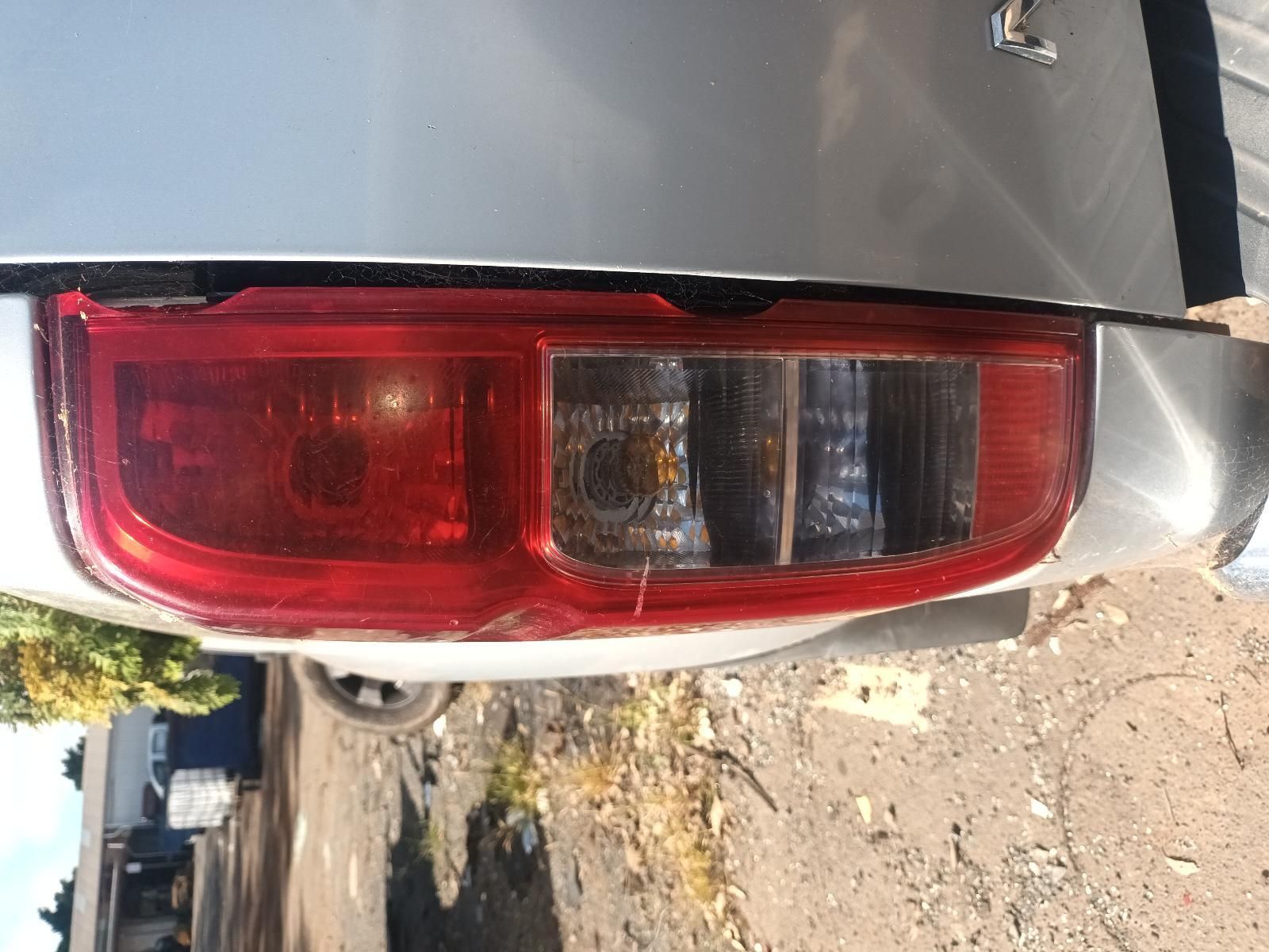 A Close Up of a Car's Tail Light on a Dirt Road — South West 4WD Wreckers in Harristown, QLD