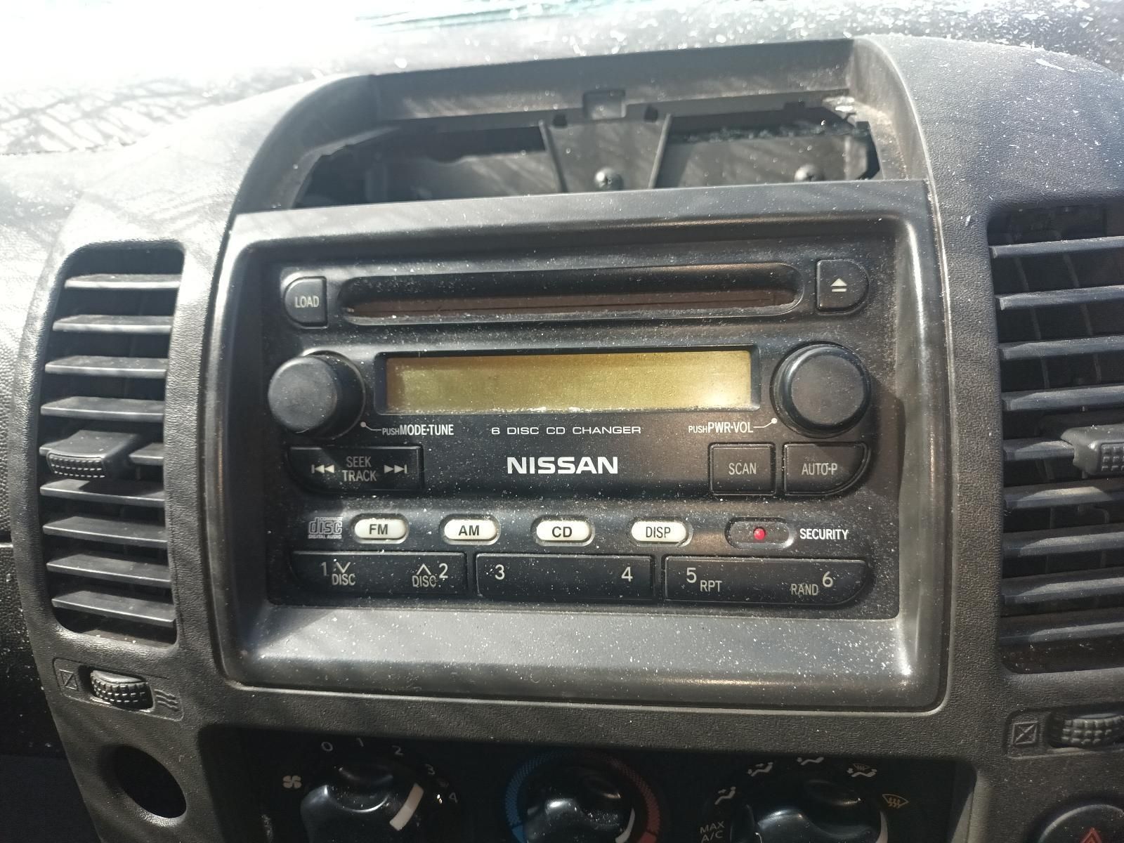 A Nissan Radio is Sitting on the Dashboard of a Car — South West 4WD Wreckers in Harristown, QLD