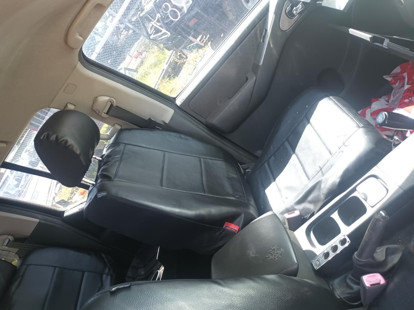 The Back Seat of a Car with Black Seat Covers — South West 4WD Wreckers in Harristown, QLD