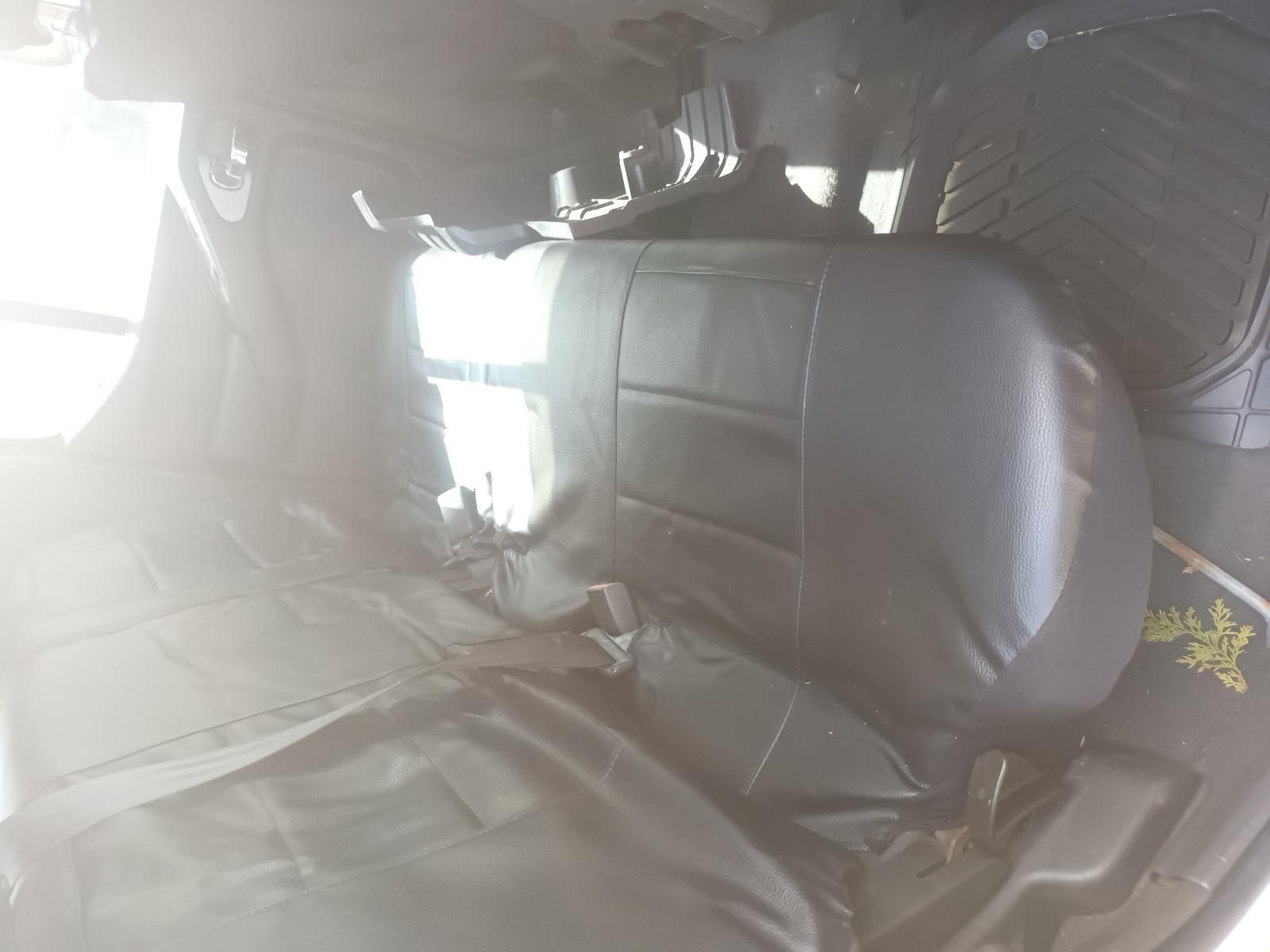 The Back Seat of a Car with a Black Seat Cover on It — South West 4WD Wreckers in Harristown, QLD