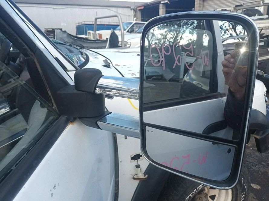 A Side View Mirror on the Side of a White Truck — South West 4WD Wreckers in Harristown, QLD
