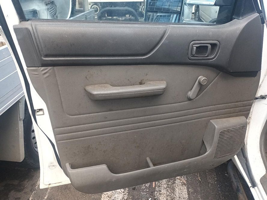 The Inside of a White Car with the Door Open — South West 4WD Wreckers in Harristown, QLD