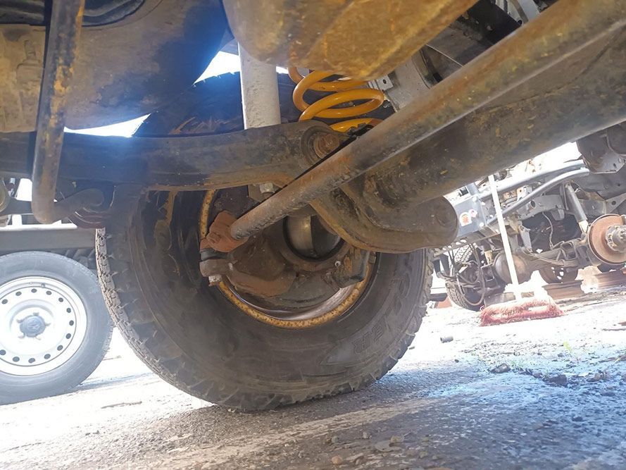 A Close Up of the Underside of a Truck 's Suspension System — South West 4WD Wreckers in Harristown, QLD