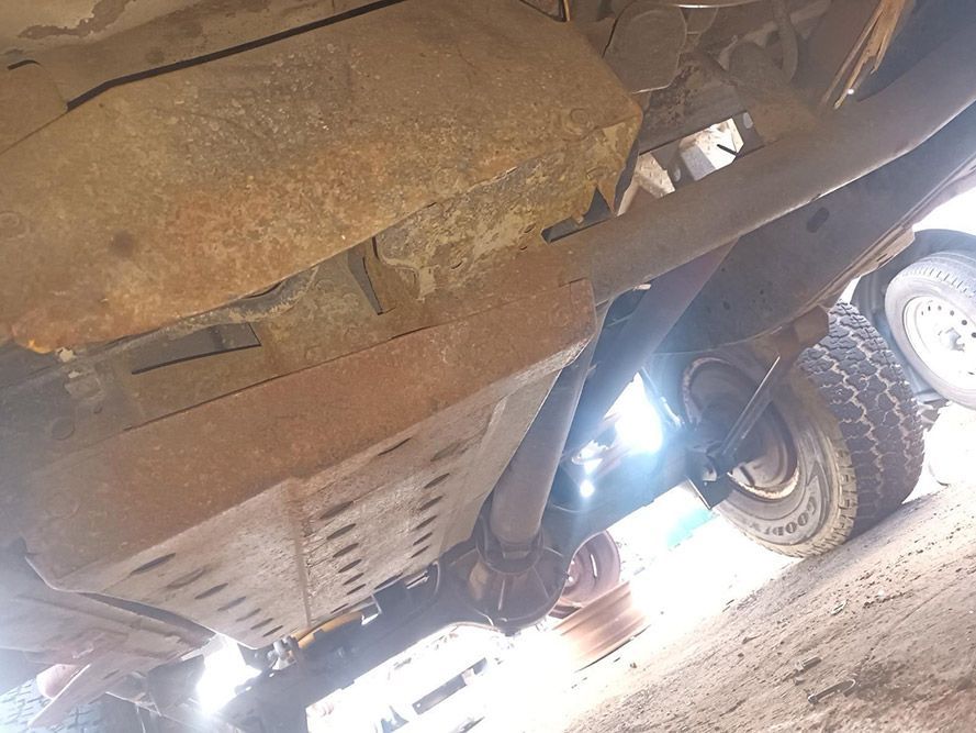 A Close Up of the Underside of a Rusty Truck — South West 4WD Wreckers in Harristown, QLD
