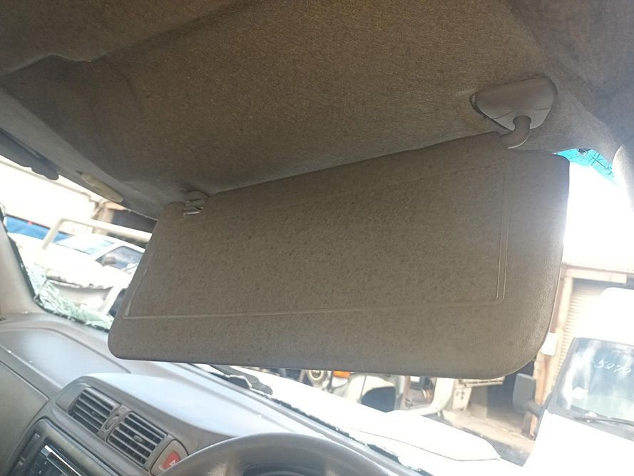 A Sun Visor is Hanging from the Ceiling of a Car — South West 4WD Wreckers in Harristown, QLD