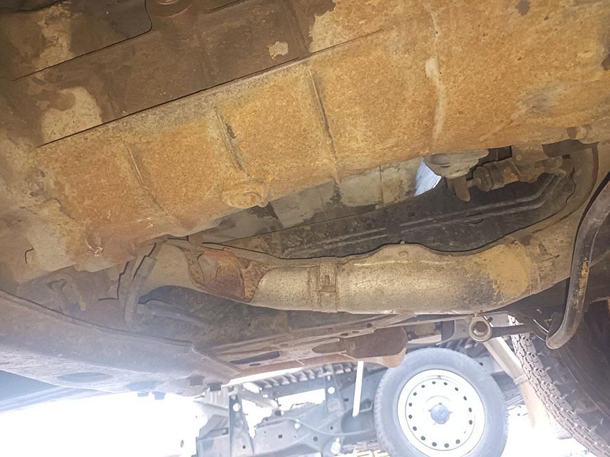 A Close Up of the Underside of a Rusty Truck — South West 4WD Wreckers in Harristown, QLD