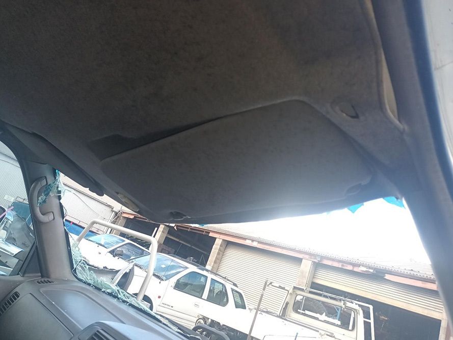 A Sun Visor is Hanging from the Ceiling of a Car — South West 4WD Wreckers in Harristown, QLD