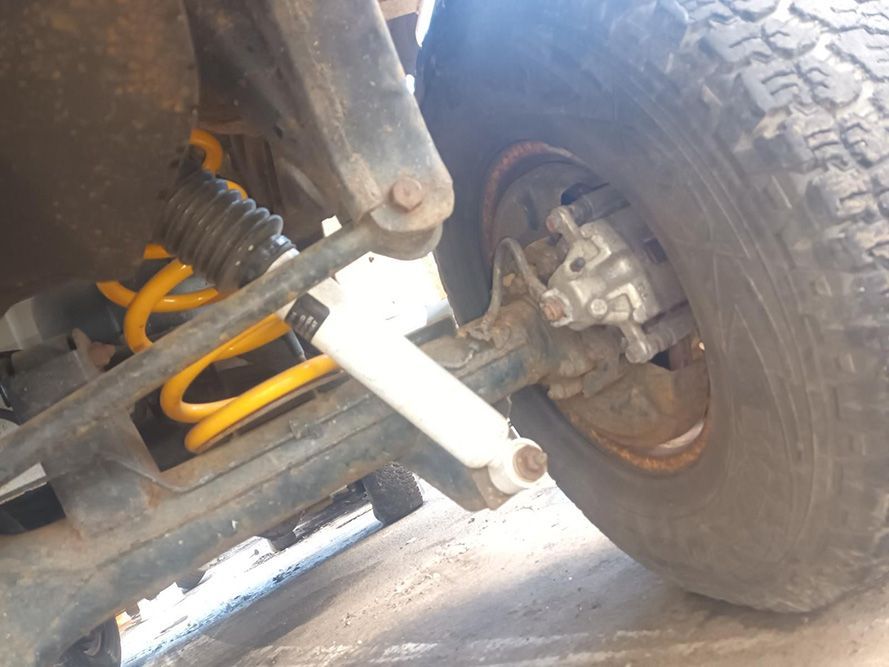 A Close Up of a Car 's Suspension and Tire — South West 4WD Wreckers in Harristown, QLD